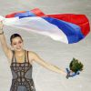 Аделина Сотникова с российским флагом
