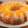 Как приготовить пирог с консервированными персиками