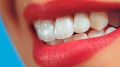 Почему зубы чернеют