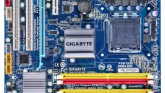 How can I tell what motherboard is in the computer