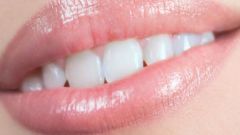 How to get rid of the black plaque on the teeth