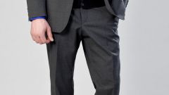 Как определить размер мужских брюк