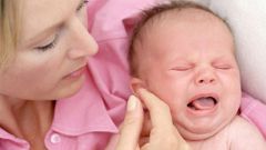 How to bring down the temperature of the child when teething