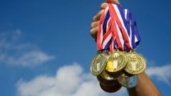 Какая страна чаще всех лидировала по количеству олимпийских медалей