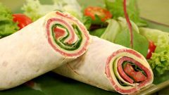 Roll of pita bread with various fillings