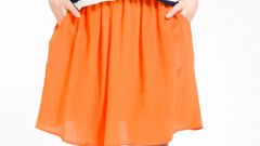 С чем носить оранжевую юбку