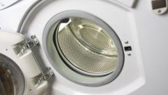 How to open the door of a running washing machine
