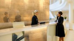 What are the duties of a receptionist
