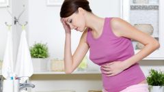 Почему при беременности болит низ живота