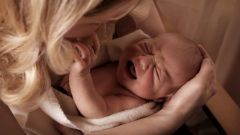 Причины колик у новорожденных