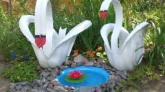 How to make a Swan from car tyres with their hands