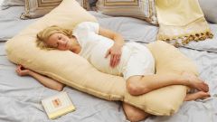 Как спать на подушке для беременных
