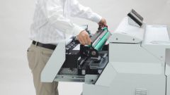 What are the differences between a plotter from a printer