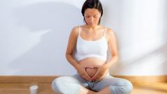 Почему болит пупок при беременности