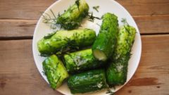 Salted cucumbers with garlic - quick and tasty snack