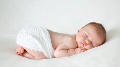 Как помочь новорожденному при коликах