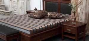 Какие кровати лучше: железные или деревянные