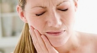 Как успокоить больной зуб