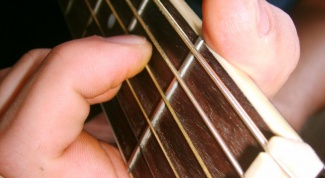 As to clamp the strings on the guitar