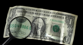 Как определить фальшивые доллары