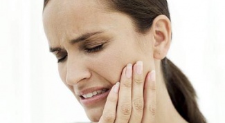 Как снять зубную боль народными средствами