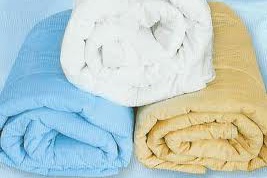 Как стирать пуховое одеяло