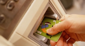 Как оплатить услуги ЖКХ через банкомат