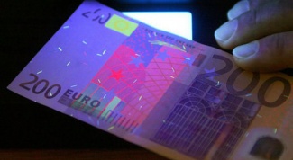 Как определить фальшивые евро