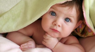 Как пеленать новорожденного в одеяло
