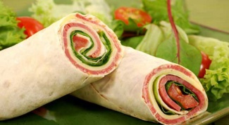 Roll of pita bread with various fillings