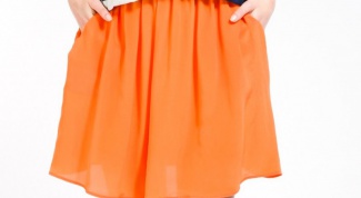 С чем носить оранжевую юбку