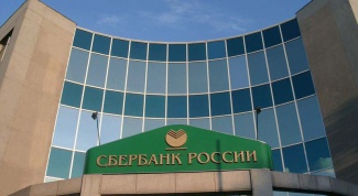 How many percent of the shares of Sberbank of Russia belongs to the state