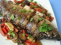 Рыба на подушке из овощей