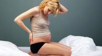 Почему болит копчик при беременности