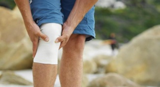 Почему болит колено