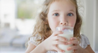 At what age a child can be given fresh cow's milk