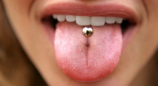 Than remove the tumor from the tongue after piercing 
