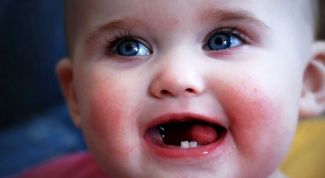 Когда прорезываются зубы у ребенка