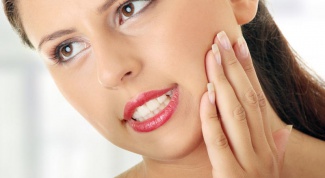 Почему болит зуб при надавливании