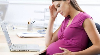 Почему болит живот и поясница при беременности