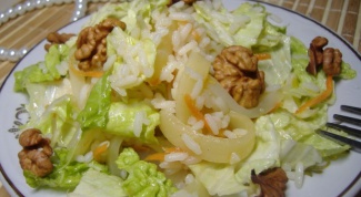 Salad with Peking cabbage, rice and squid