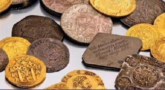 Где и когда появились первые монеты с изображением