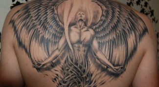 Что означает татуировка ангела