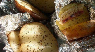 Baked potatoes with bacon in foil