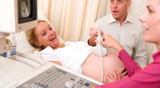 Признаки беременности двойней