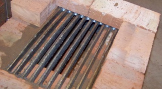Grate as an integral element of the furnace 