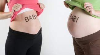 What is the shape of the abdomen during pregnancy boy 