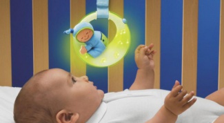 How to hang a toy over the crib