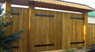Как сделать и установить деревянные ворота 