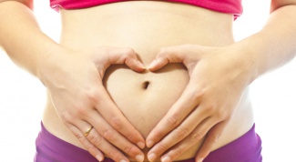 Первые симптомы беременности